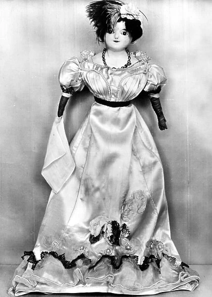 Wax doll with cloth body. English, c1820