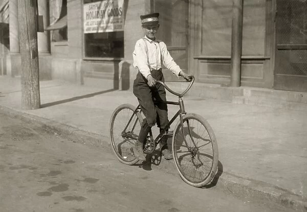 WESTERN UNION MESSENGER. A fourteen-year-old messenger boy for Western Union in Shreveport, Louisiana. Photograph by Lewis Hine, November 1913