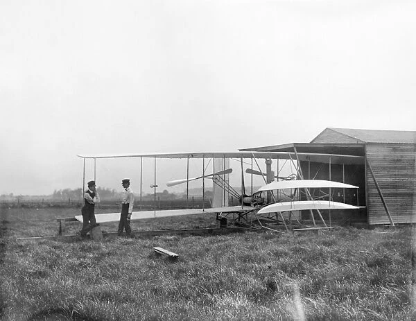 Wilbur and Orville Wright with their second airplane at Huffman Prairie, Dayton, Ohio, 1904