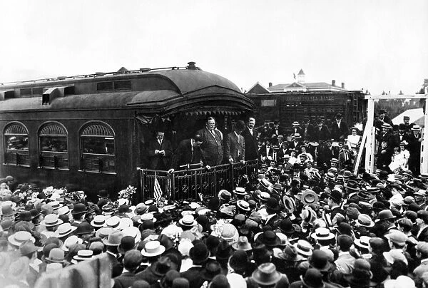 WILLIAM HOWARD TAFT (1857-1930). 27th President of the United States. Taft on the back of a railroad car, speaking to a crowd. Photograph, c1909
