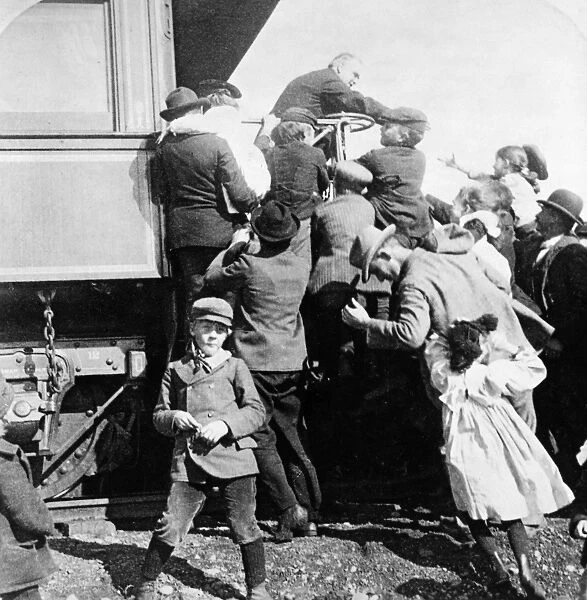 WILLIAM McKINLEY (1843-1901). 25th President of the United States. Children greeting the President at the railroad station of his home town, Canton, Ohio, in the presidential election year of 1900. Stereograph by Strohmeyer and Wayman