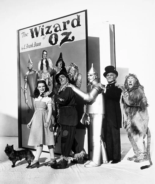 WIZARD OF OZ, 1939. Judy Garland as Dorothy, Ray Bolger as the Scarecrow, Jack Haley as the Tin Woodman, Frank Morgan as the Wizard and Bert Lahr as the Cowardly Lion