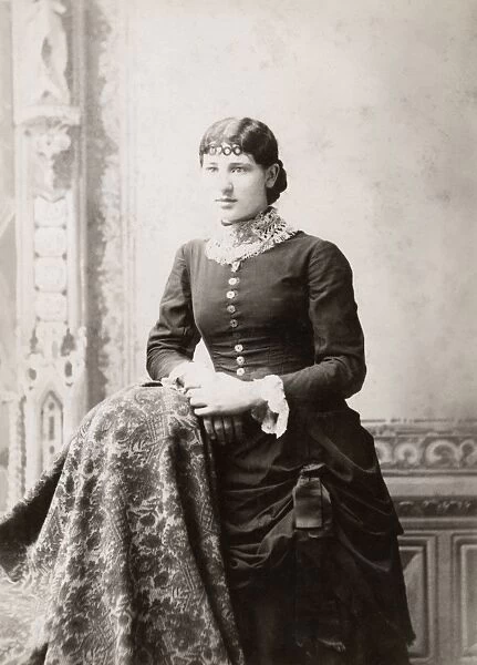 WOMAN, c1880. Portrait of a woman. Cabinet card from a studio in Crown Point, Indiana