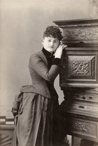 WOMAN, c1880. Portrait of a woman photographed by the Hunter Brothers studio in Taunton