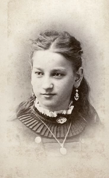 WOMAN, c1880. Portrait of a young woman. Carte de visite from a photography studio in Crown Point