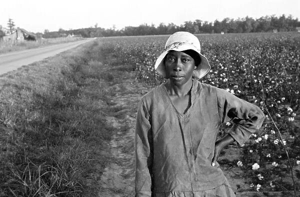 WOMAN IN FIELD, 1935. Woman standing in cotton field, Pulaski County, Arkansas