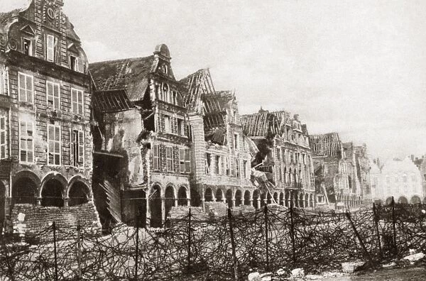 WORLD WAR I: ARRAS. View of destroyed homes in Arras, France. Photograph, c1916