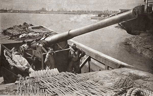 WORLD WAR I: BATTERY. Large naval gun taken from a British monitor on a floating