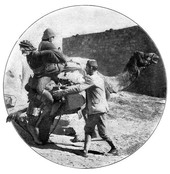 WORLD WAR I: CAMEL, 1915. Two Turkish soldiers mounting a camel during World War I