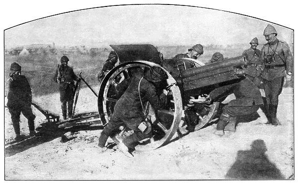 WORLD WAR I: CANNON, 1915. Turkish soldiers equipping a cannon with desert tires