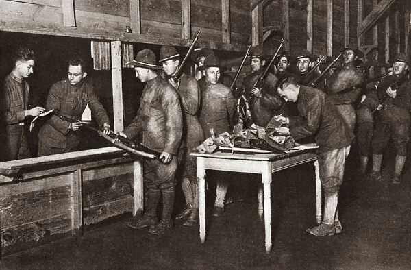 WORLD WAR I: DISCHARGE. Troops turning in their guns after being discharged at Camp Dix