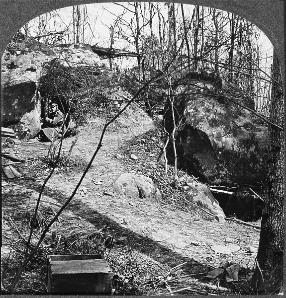 WORLD WAR I: FRENCH TRENCH. Stereograph view of dugouts in holes under boulders