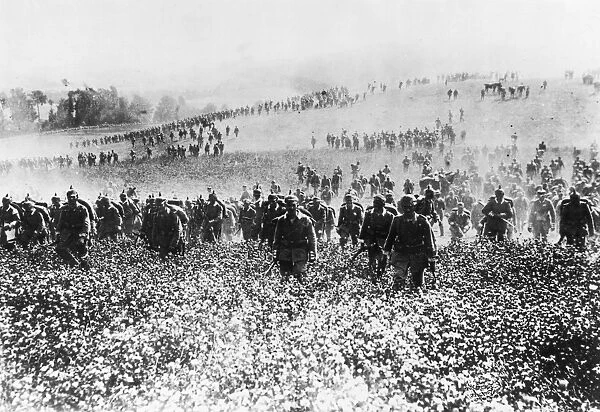 WORLD WAR I: GERMAN ARMY. German troops advancing in Flanders during World War I