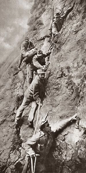 WORLD WAR I: ITALIAN ALPS. Troops clinging to a cliffside in the Italian Alps during World War I