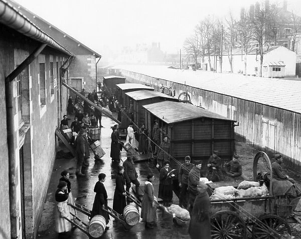 WORLD WAR I: NEVERS. French women loading boxcars with supplies for soldiers at Nevers, France
