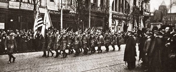 WORLD WAR I: OCCUPATION. The American Army marching through Aachen (Aix-La-Chapelle)