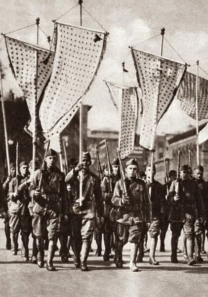 WORLD WAR I: PARADE, 1919. Members of the 77th Division march in a parade carrying