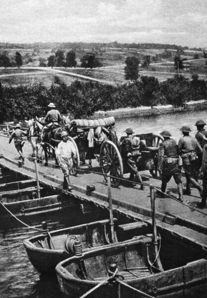 WORLD WAR I: PONTOON BRIDGE. American troops passing over the Marne River on a