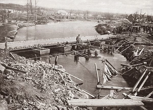 WORLD WAR I: PONTOON BRIDGE. British Royal Engineers building a pontoon bridge