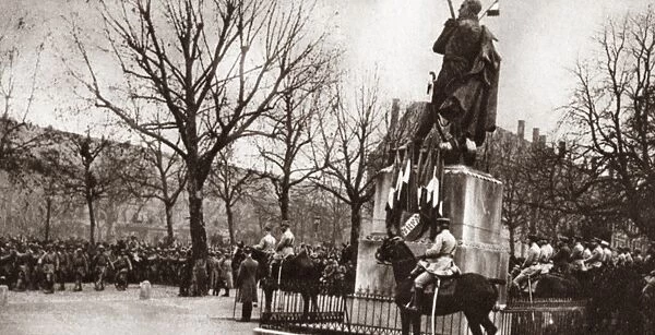 WORLD WAR I: REVIEW, 1918. Marshal Petain before the statue of Marshal Ney reviewing