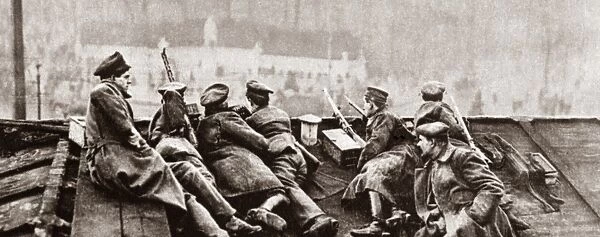 WORLD WAR I: REVOLUTION. Government troops on the roof of a building being targeted