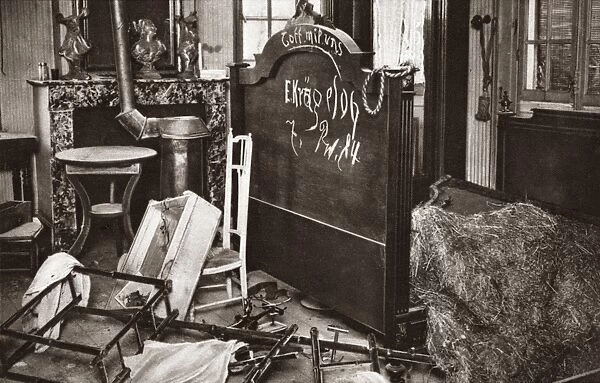 WORLD WAR I: ROOM PILLAGED. Graffiti written in German on headboard of pillaged