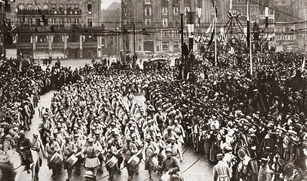 WORLD WAR I: STRASBOURG. Playing drums and trumpets, the French Army enters the