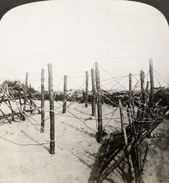 WORLD WAR I: TRENCHES. Stereograph view of barbed wire entanglements protecting