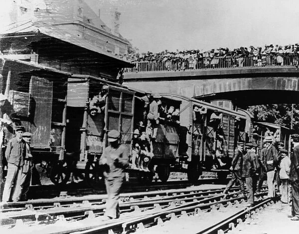 WORLD WAR I: U. S. MARINES. French citizens celebrating the arrival of U