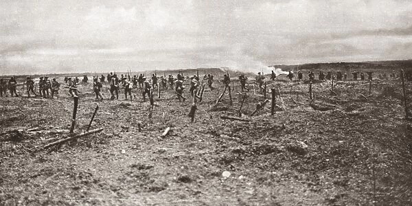 WORLD WAR I: VIMY RIDGE. Canadians breaking through German barbed wire entanglements