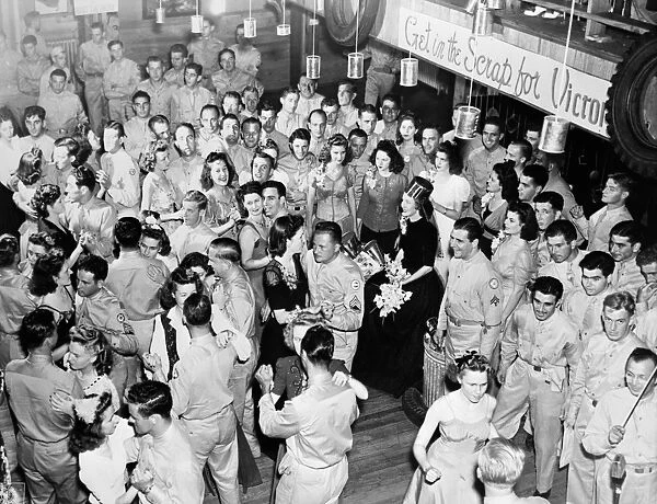 WORLD WAR II: DANCE, c1943. American troops attend a dance, possibly to encourage