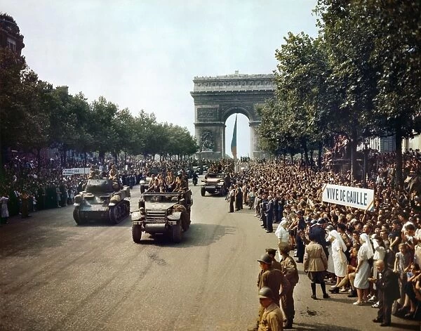 WORLD WAR II: PARIS, 1944. Crowds of French patriots lining the Champs Elysees
