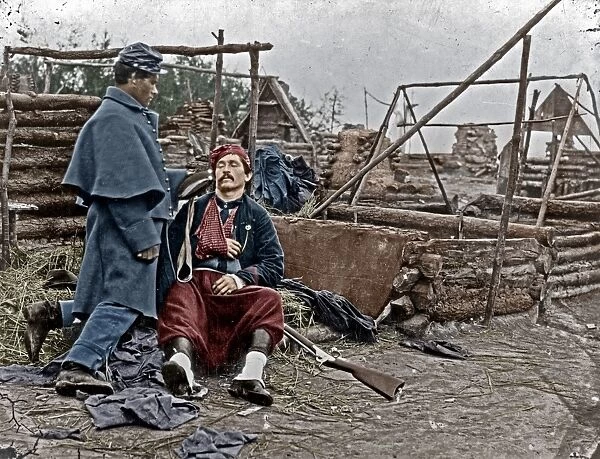 WOUNDED SOLDIER, c1865. A wounded Union soldier in a deserted camp. Photograph, c1865