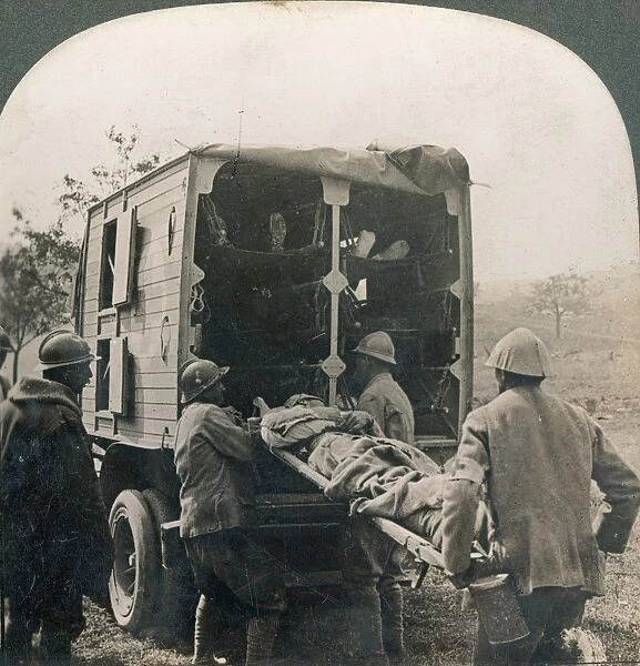 WW I: WOUNDED  /  MEDICS. Taking away the wounded in motor ambulances; Somme, France
