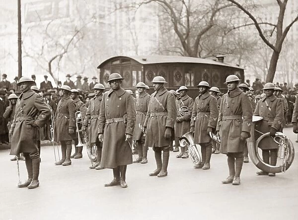WWI: BAND, 1919. Lieutenant James Reese Europe with the regimental band of the