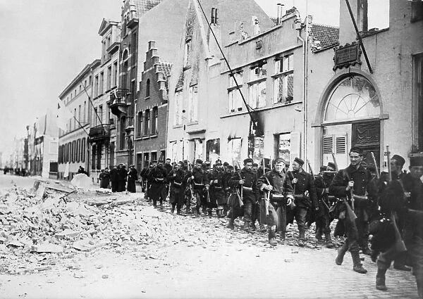 WWI: BELGIAN ARMY, c1914. Belgian troops in Dendermonde, Belgium. Photograph, c1914