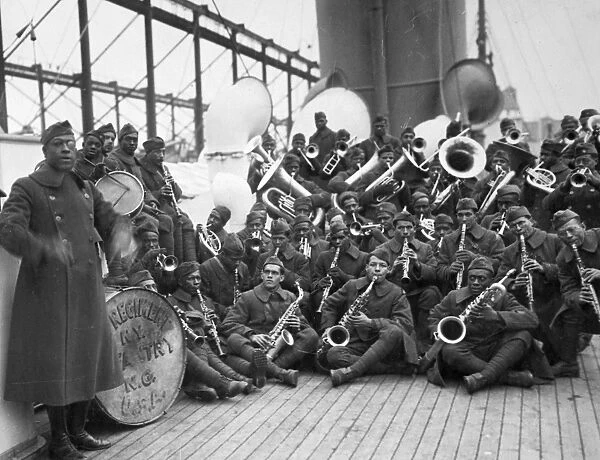 WWI: HOMECOMING, 1919. Lieutenant James Reese Europe with the regimental band of