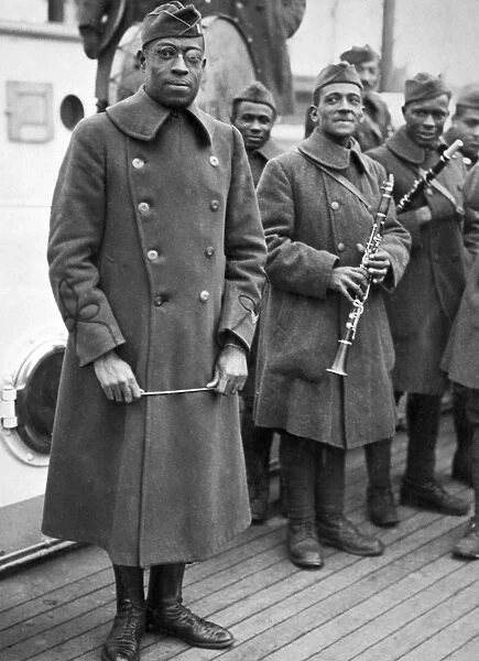 WWI: HOMECOMING, 1919. Lieutenant James Reese Europe with the regimental band of