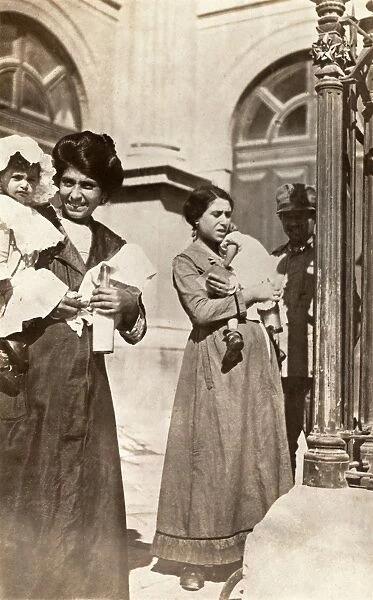WWI: ITALY, c1918. Italian mothers receiving milk distributed by the American Red