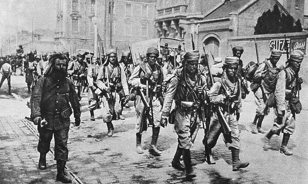 WWI: NORTH AFRICAN TROOPS. North African troops from French colonies marching through