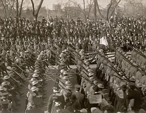 WWI: PARADE, 1919. The 369th Infantry Regiment passing the reviewing stand along