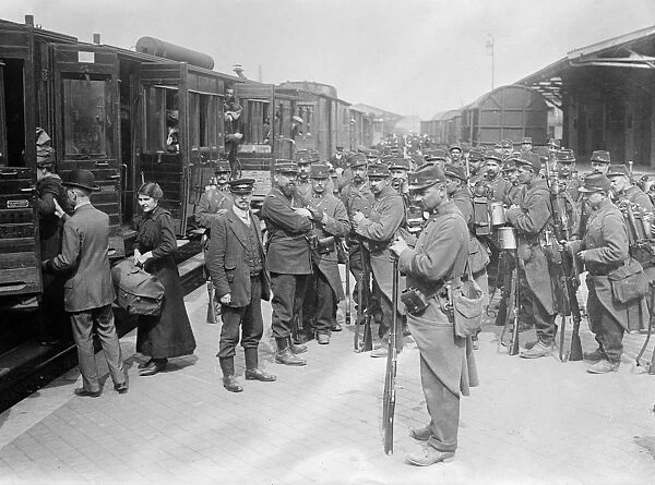 WWI: SOLDIERS, 1914. French soldiers at a train station in Dunkerque, France. Photograph