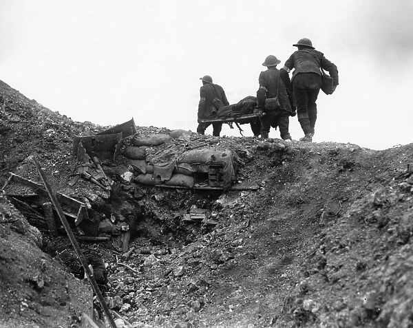 WWI: SOMME, 1916. Soldiers carrying a wounded man on a stretcher during The Battle