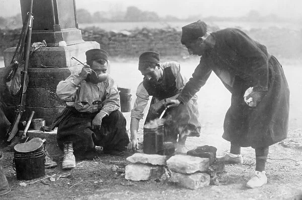 WWI: ZOUAVES, c1914. French Zouaves drinking with ladles. Photograph, c1914
