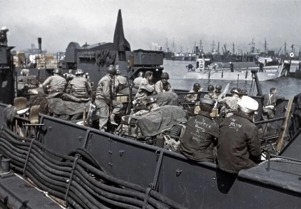 WWII: D-DAY, 1944. American troops on board a landing ship in a British port, shortly