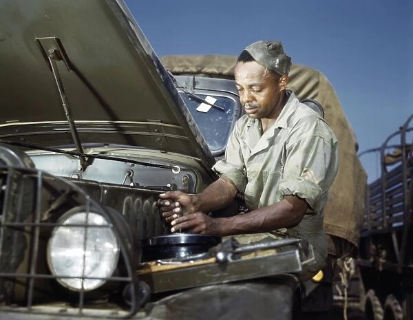 WWII: MECHANIC, 1942. African American mechanic at work, Fort Knox, Kentucky