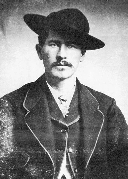 WYATT EARP (1848-1929). American lawman. Photograph, mid 1870s