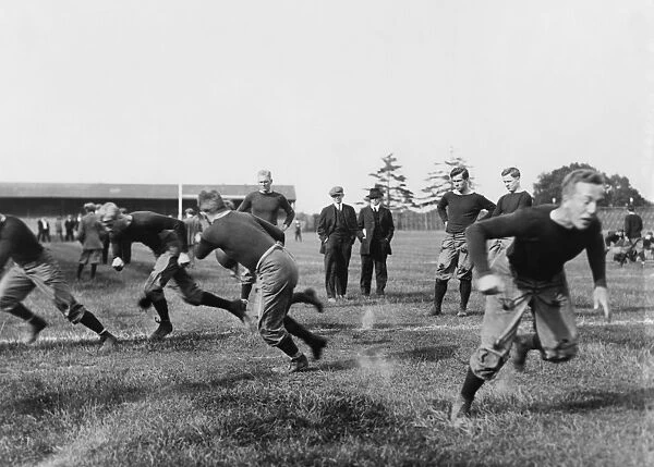 YALE: FOOTBALL PRACTICE. The Yale University football team at practice. Photograph, c1910