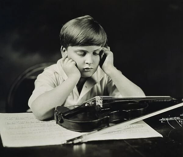 YEHUDI MENUHIN (1916-1999). American conductor and violinist: photographed in 1924