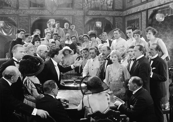 THE YELLOW TYPHOON, 1920. The Oriental gambling house run by The Yellow Typhoon, played by actress Anita Stewart (right)
